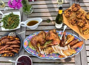 cut turkey on a colorful plate with stuffing and gravy