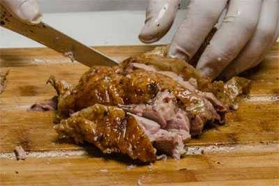 slicing turkey thigh meat