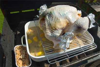 indirect setup for BBQ turkey on a gas grill using wood chips