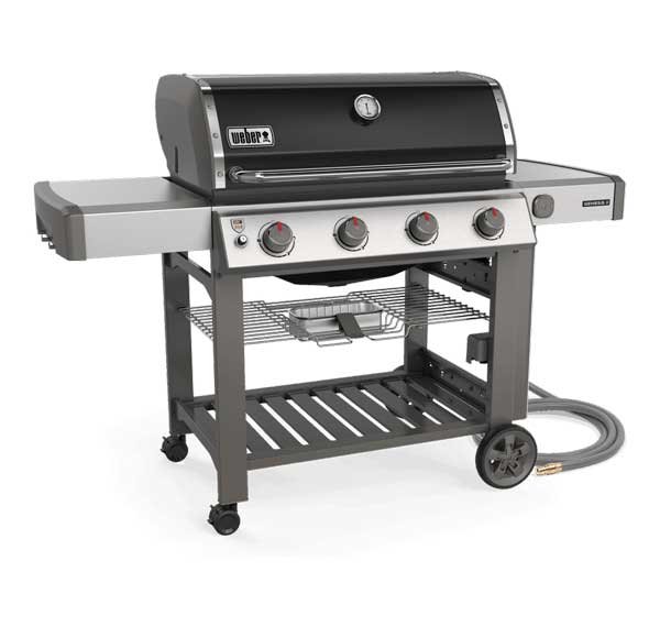 4-Burner Gas Grill with a black lid, shiny front and shiny shelves on each side, mounted on four heavy legs with four wheels and a shelf on the bottom.