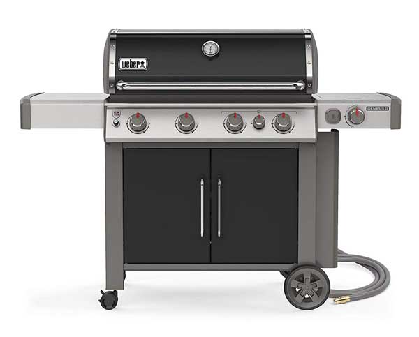 Large, black gas grill with double door cart. A hose is attached to the right side.