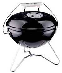 small black portable charcoal kettle shaped grill.