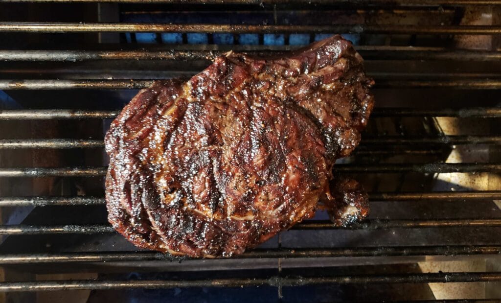 steak on grill grates