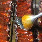 ribs being sauced