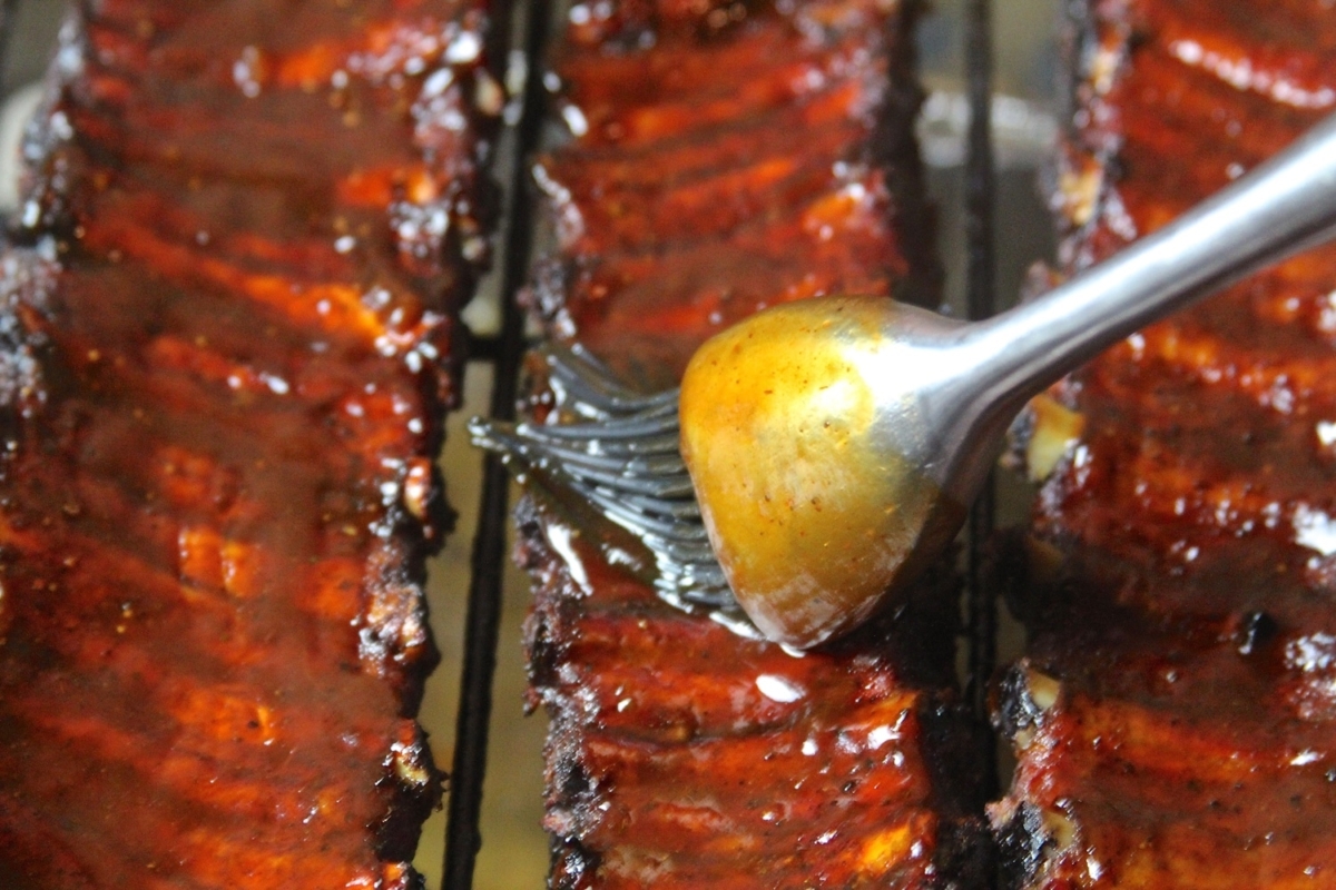 ribs being sauced