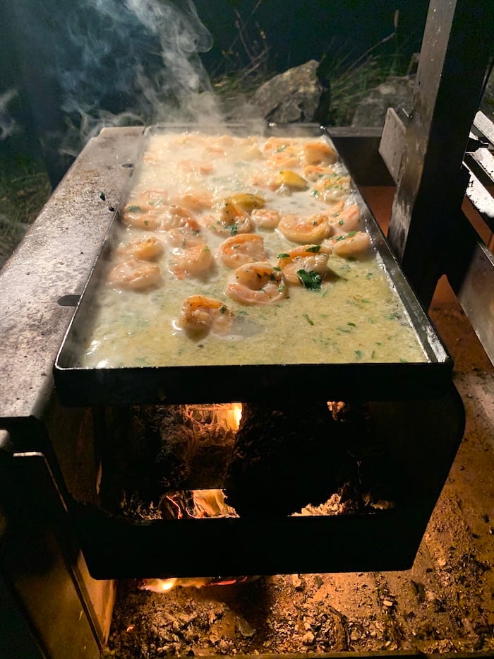 shrimp and sauce in griddle