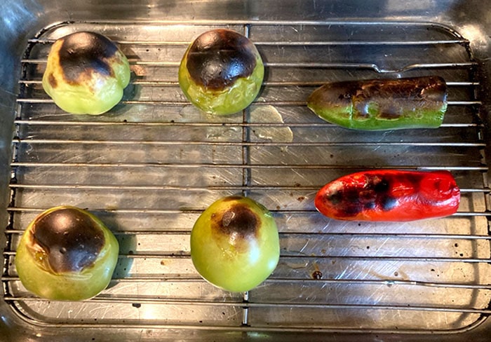 charred tomatillos in broiler