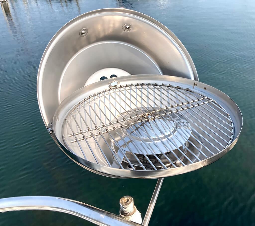 Magma Marine Grill mounted over water