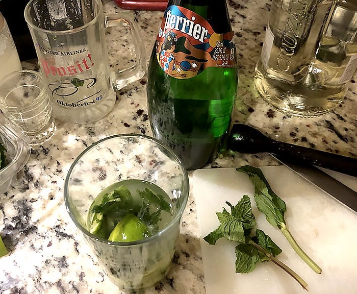 Mojito cocktail in the process of construction