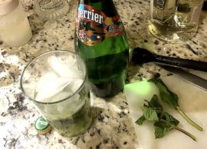 Mojito cocktail in the process of construction.