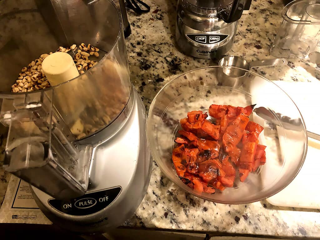 making grilled tomato pesto in a food processor