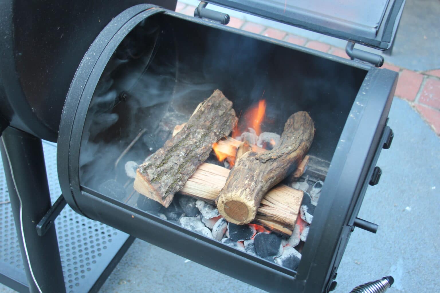Wood burning in side firebox of the Grand Champ