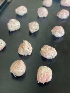 meatballs on a griddle.