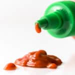 Dripping bottle of Sriracha