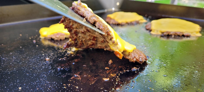 Weber Slate smash burgers with cheese