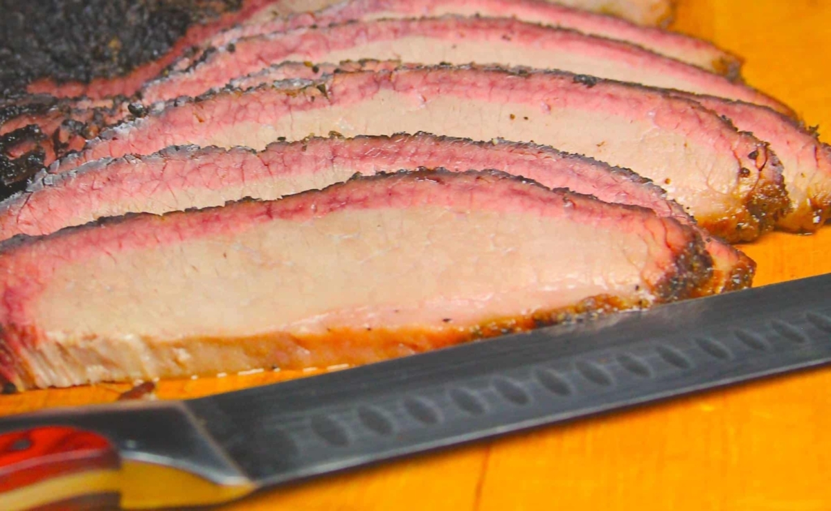 Sliced brisket and a knife