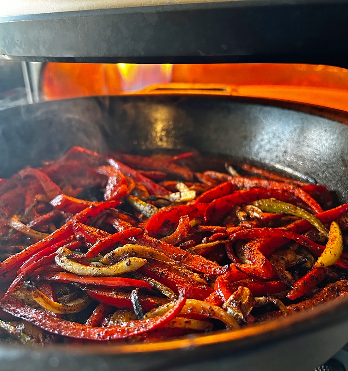 Fajita peppers roasting in the Gozney Arc pizza oven