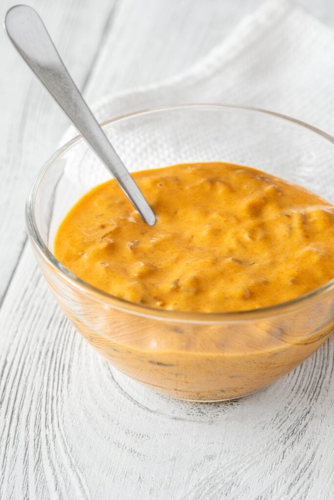 big mac sauce in glass bowl with spoon.