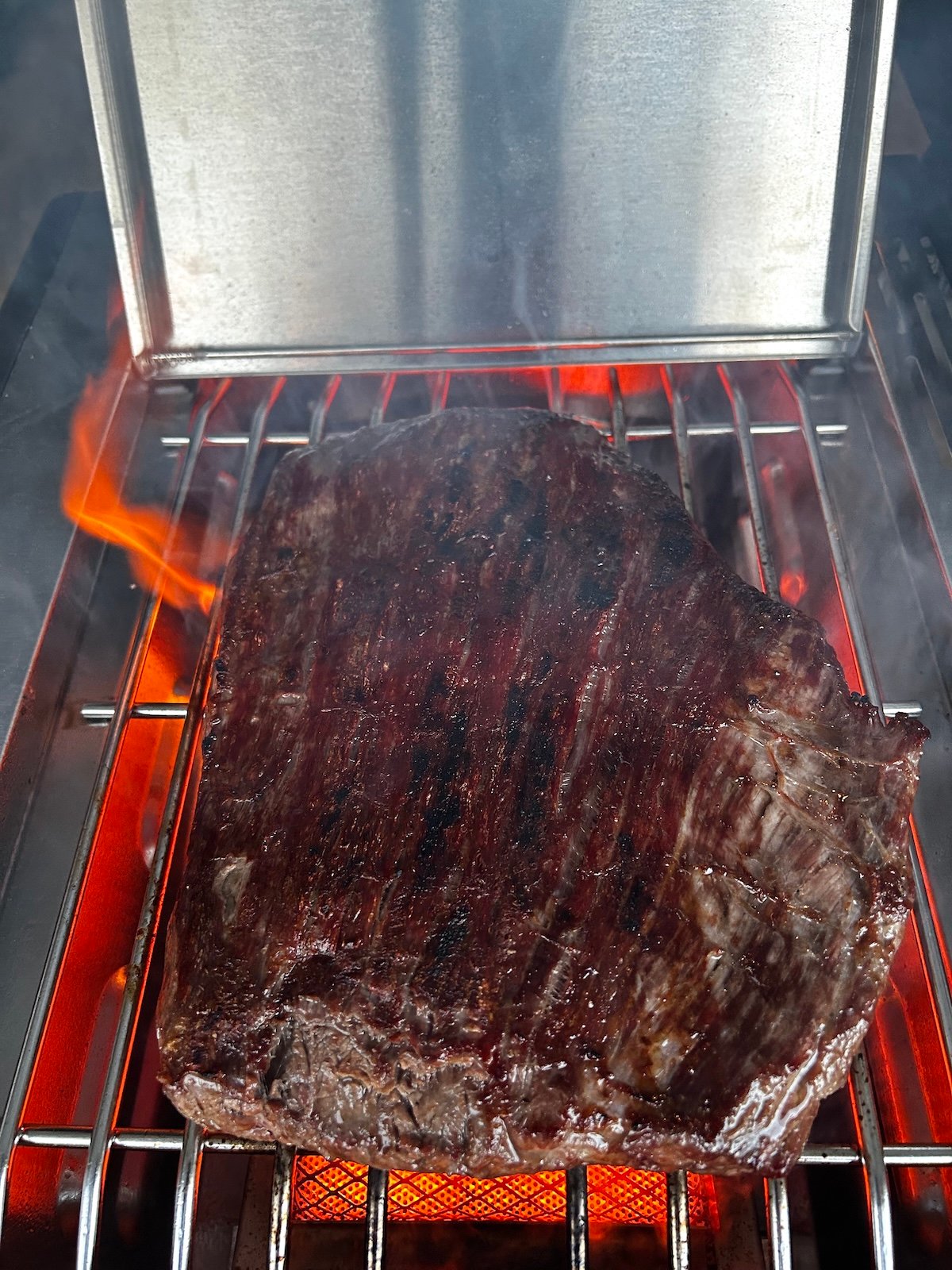 flank steak searing on grill sear burner