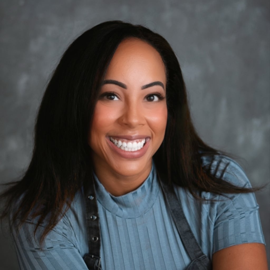 headshot of Erica Blaire, champion pitmaster and certified sommelier