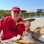 Meathead holding a smoked chub