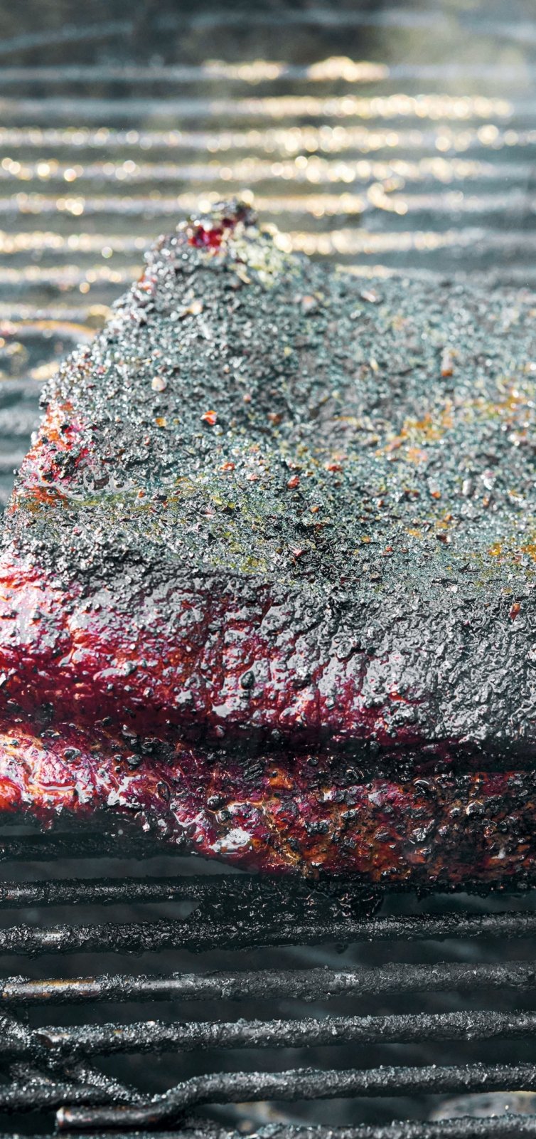 Dominique Rioux's smoked brisket on a grill