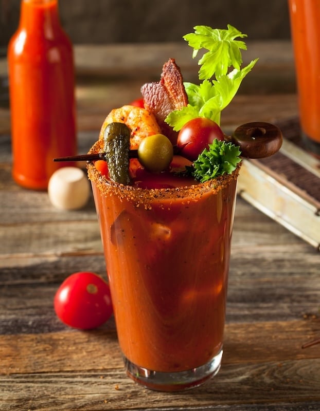 smoked bloody mary with bacon and celery stick