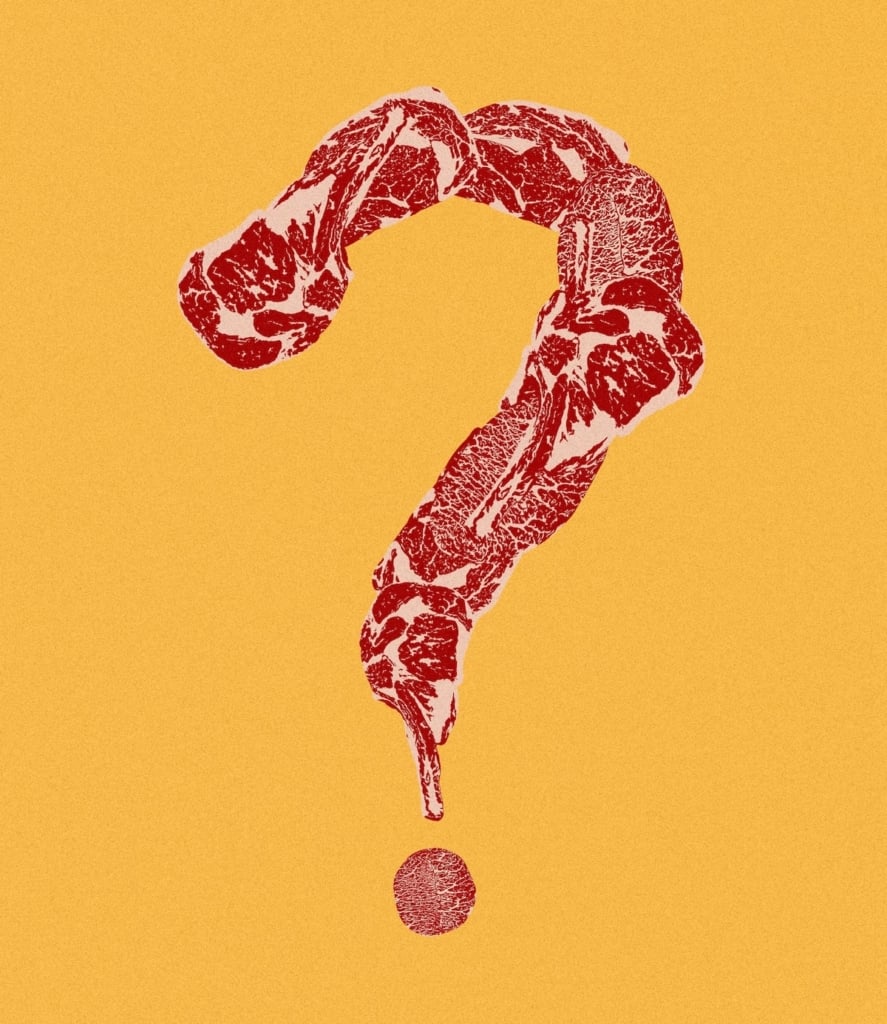pieces of red meat arranged in the shape of a question mark.