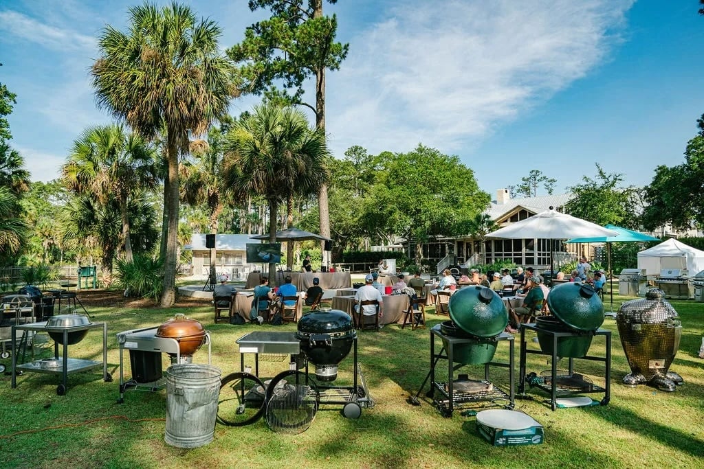 Various smokers arranged on a grass lawn