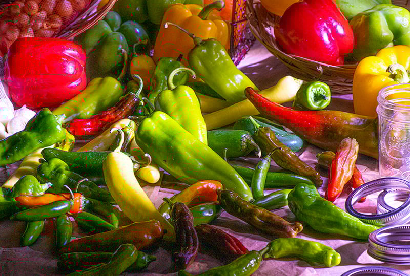 A group of peppers and other vegetables

AI-generated content may be incorrect.