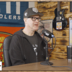 Clint Cantwell speaking into a microphone