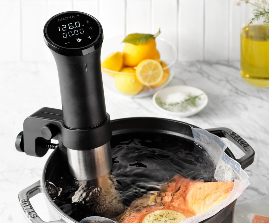 Anova sous vide immersion circulator in a pot of water
