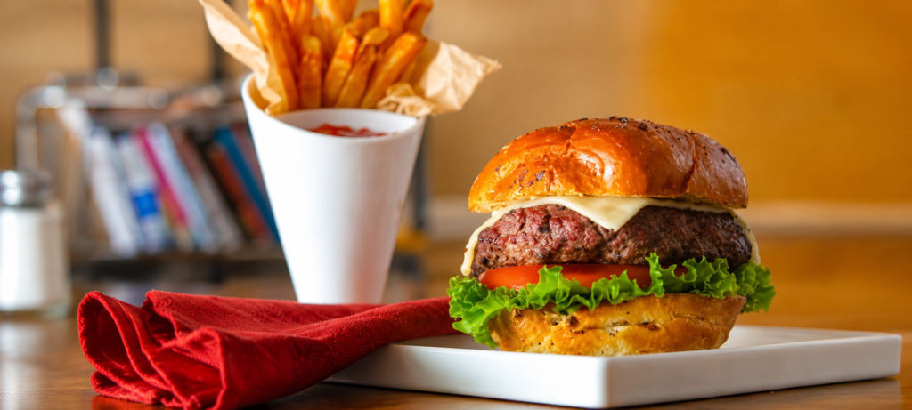 Mushroom and beef blended burger plated with fries