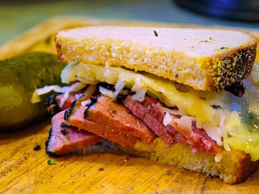 Pastrami Reuben sandwich with sauerkraut and Swiss cheese