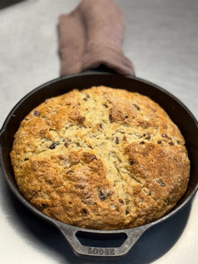 Irish soda bread in a cast iron pan.