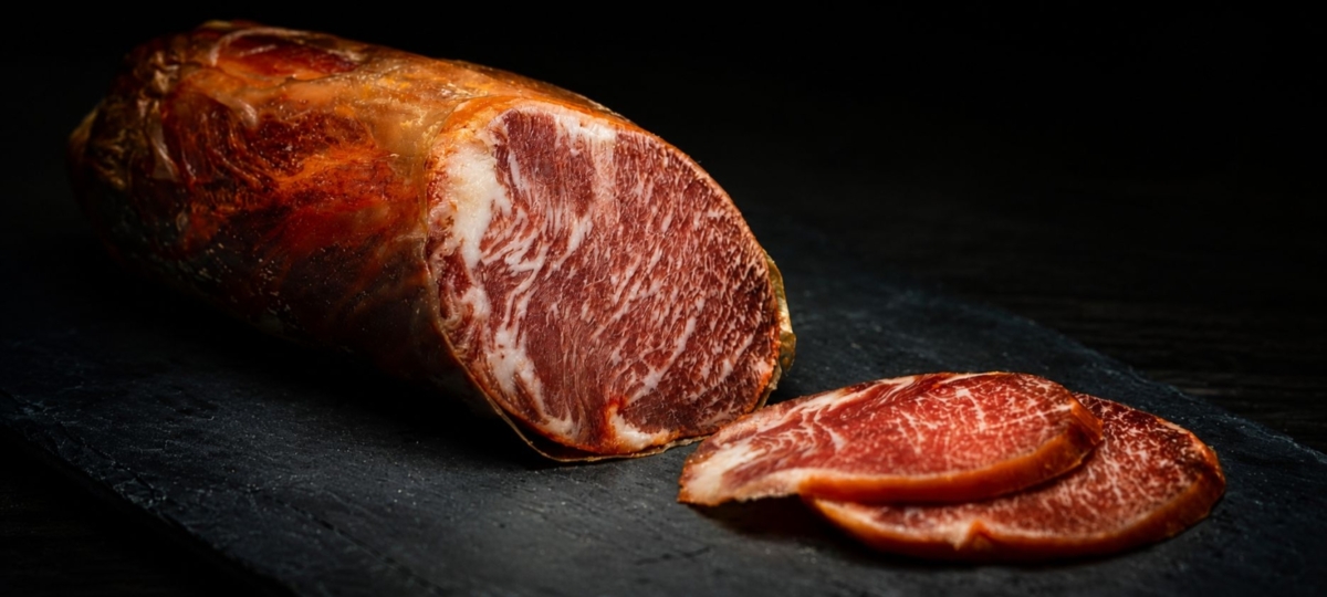 Sliced Spanish lomo cured pork tenderloin.
