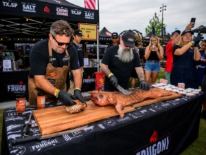 Al Fragoni and teammate live whole hog cooking demonstration.