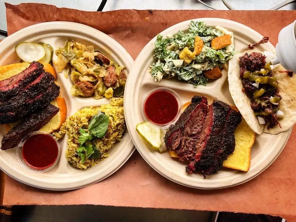 Two plate of barbecue at LeRoy an Lewis Barbecue in Austin, Texas.