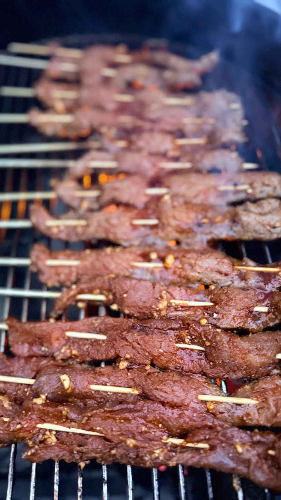 West African suya beef skewers on a Weber 22-inch Performer Smart Charcoal Grill.