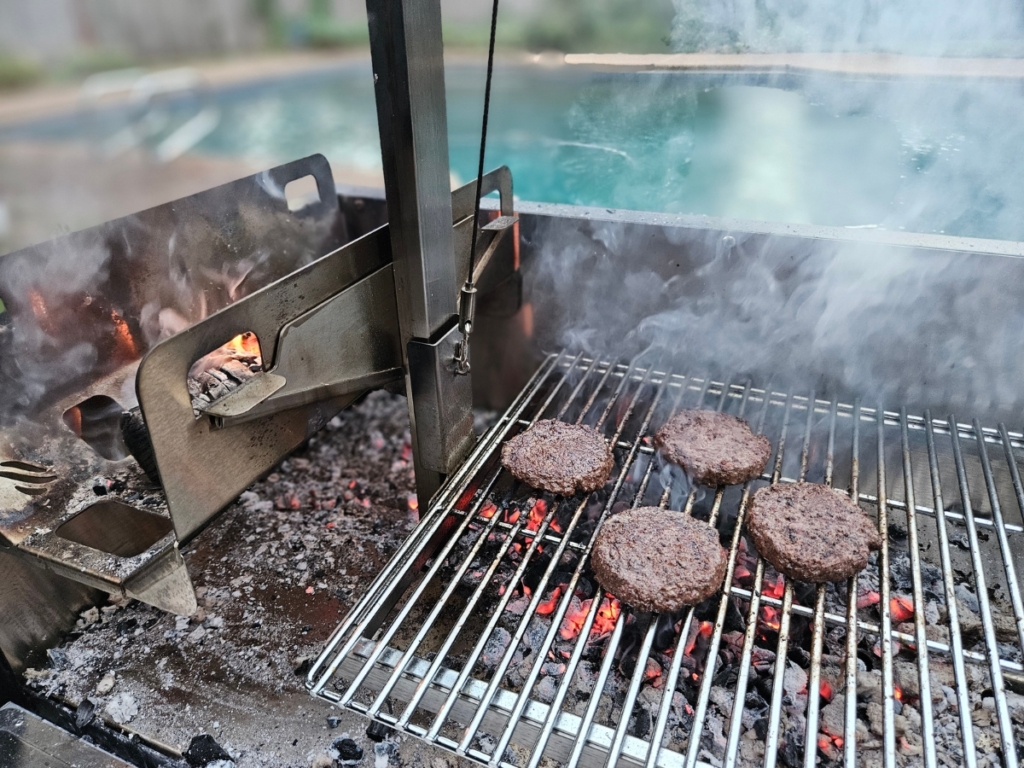 Cooked hamburger patties on the Blackstone Bronco.